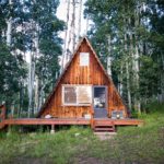 15 Interesting Vertical Log Cabins